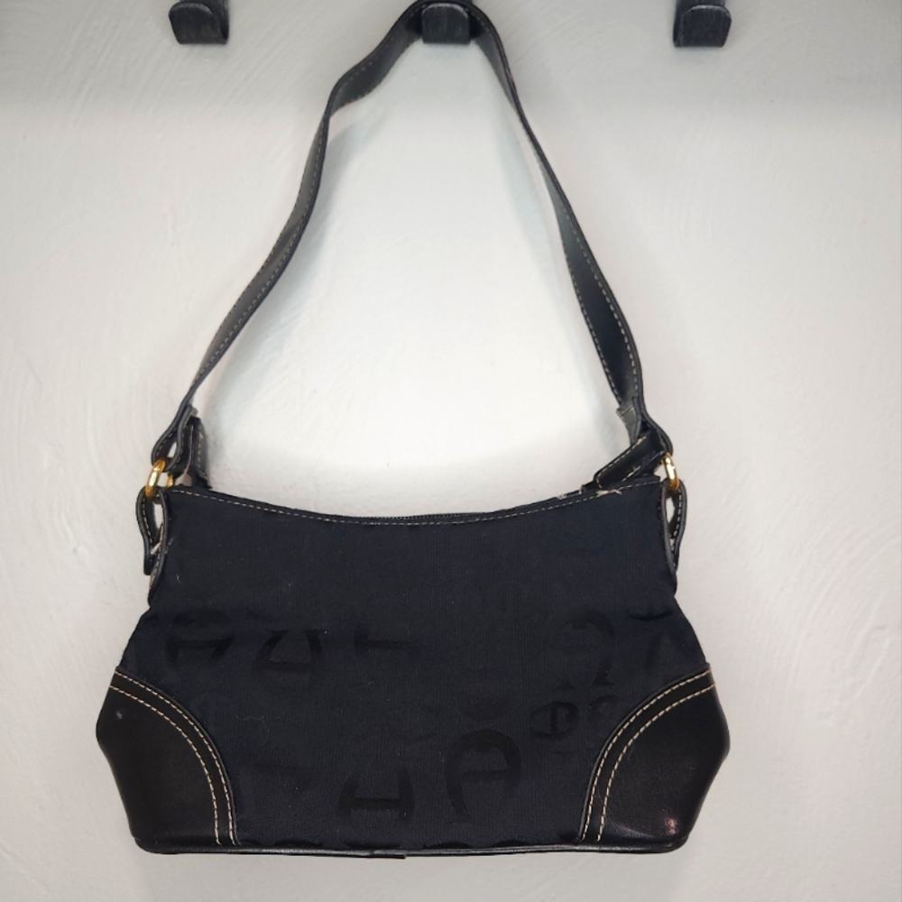 Etienne Aigner• Black Vintage monogram shoulder bag.